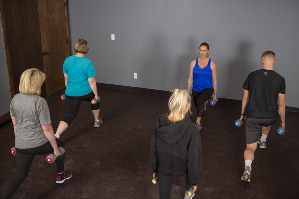 Group fitness class being led by an instructor